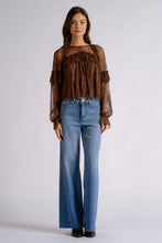 Elan Mocha brown lace long-sleeve top, styled with jeans