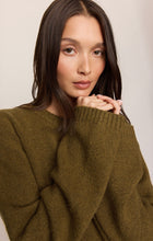 Golden Sage Chill Mode Sweater by z supply in a cozy olive green knit worn by a model