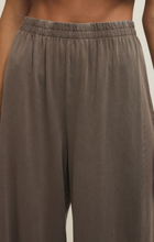Close-up of z supply Perfectly Taupe Scout Jersey Crop Flare Pant featuring elastic waistband and soft fabric texture