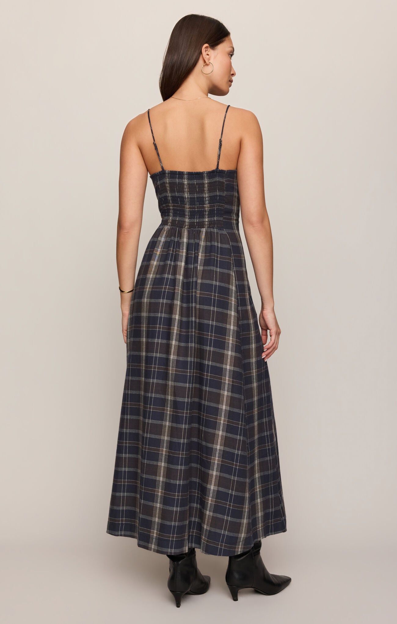 Eclipse Evermore Plaid Midi Dress by z supply shown from the back in dark plaid with thin straps and boots