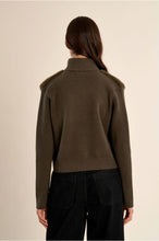Back view of Molly Bracken Khaki Knitted Jacket worn with black trousers