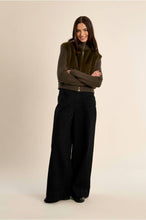 Khaki Knitted Jacket by Molly Bracken styled with black wide leg trousers on a model